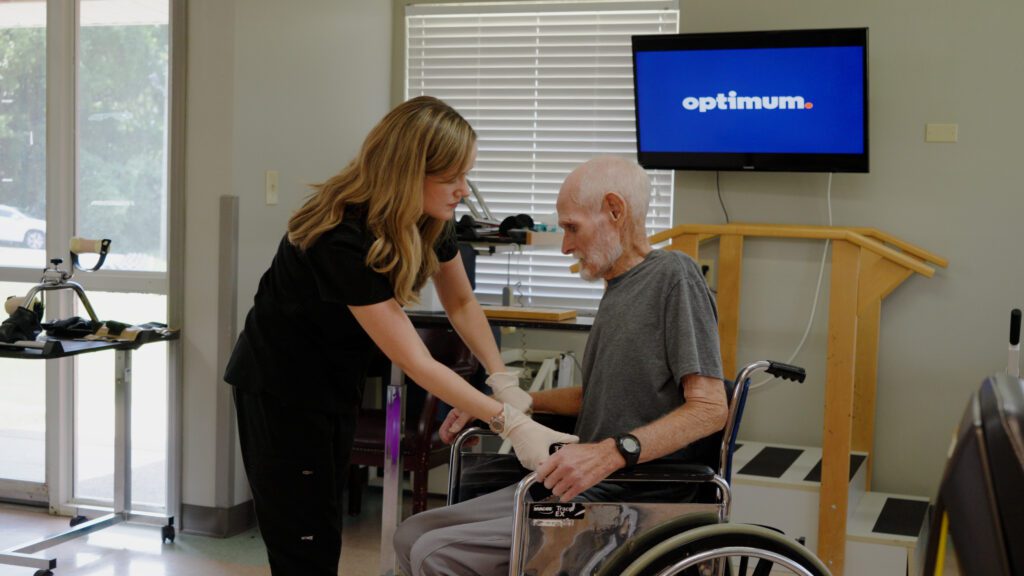 A nurse and a patient at a skilled nursing facility